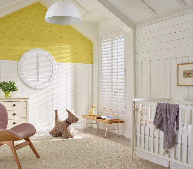 nursery with wood shutter window coverings