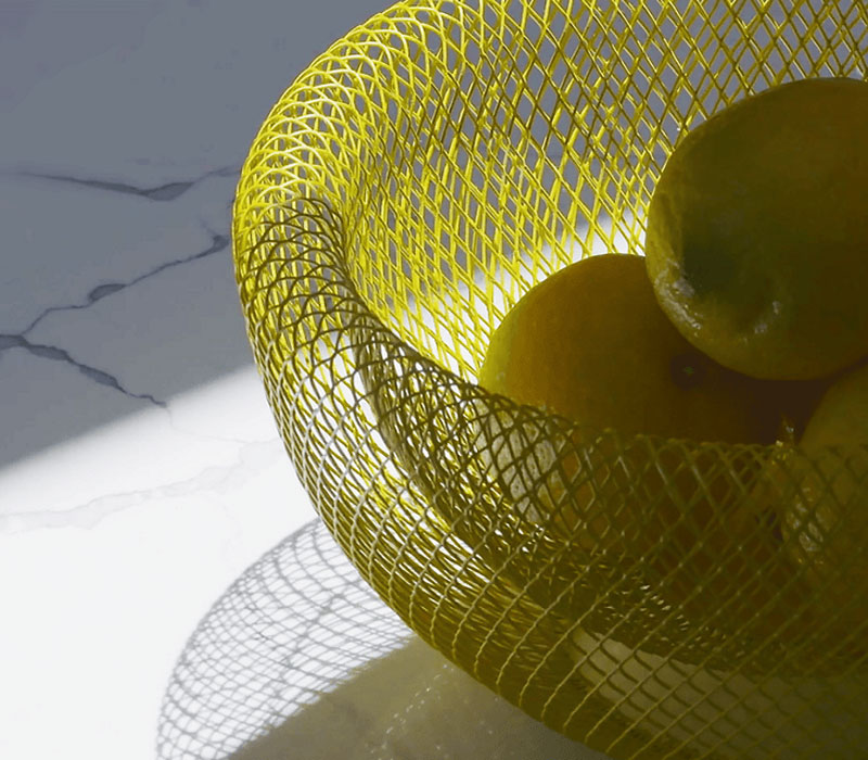 lemons in bowl with light showing through